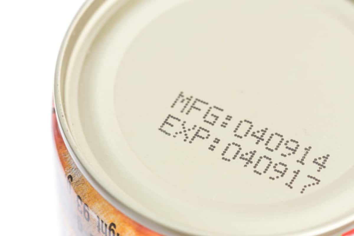 this picture shows expiry label of a can