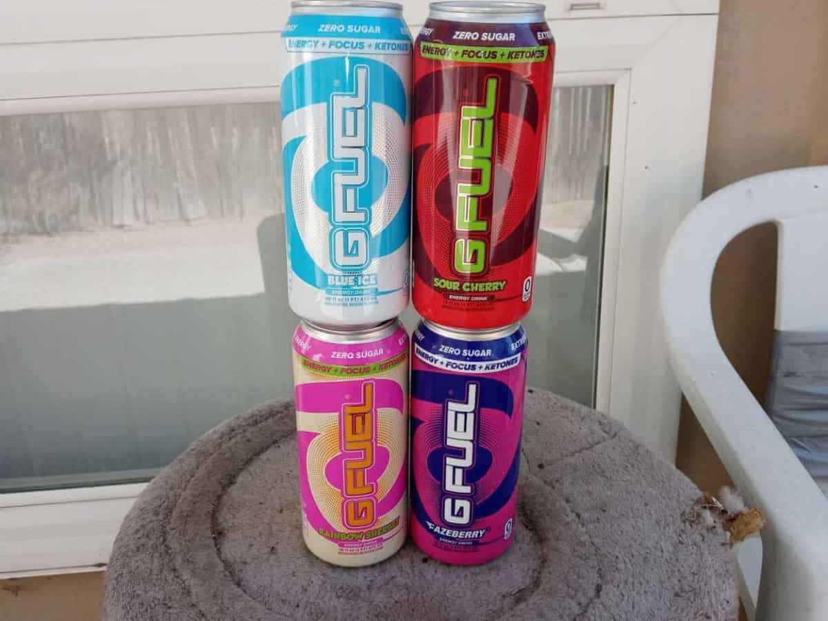 A picture of Four different flavors of G Fuel