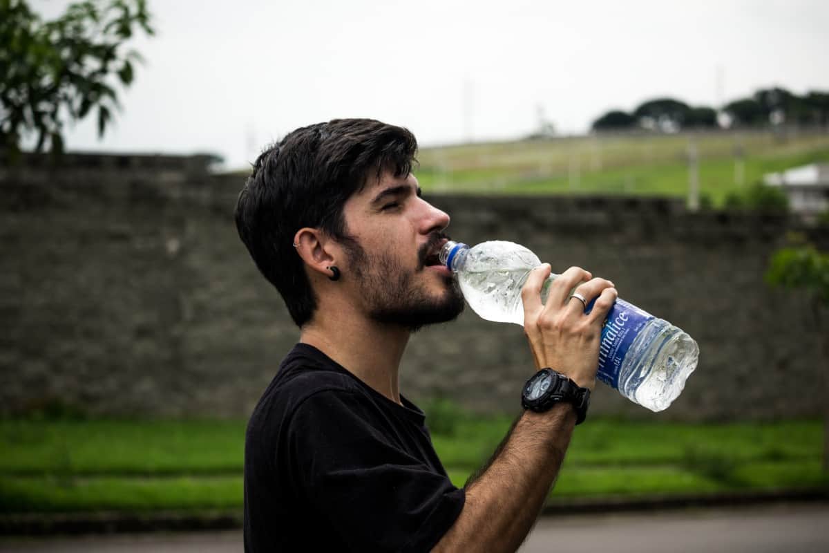 A person drinking water.